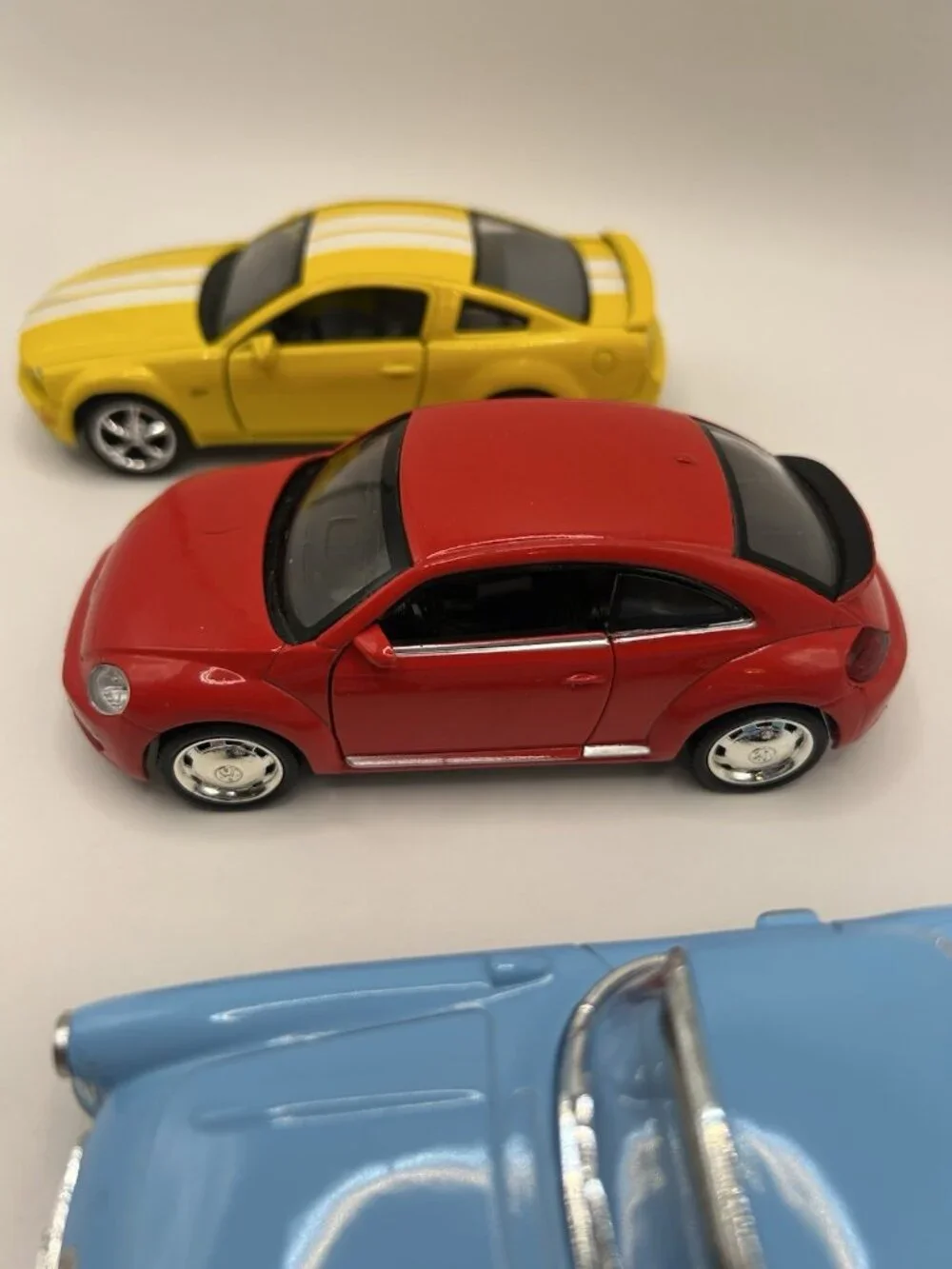 Lot of 3 Diecast Cars Corvette VW Beetle Mustang Kinsmart Scale Blue Red Yellow